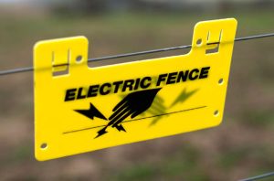 electric fence warning sign